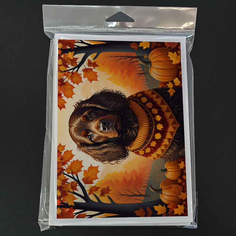 Packaged autumn greeting card showing brown spaniel illustration with pumpkins and leaves