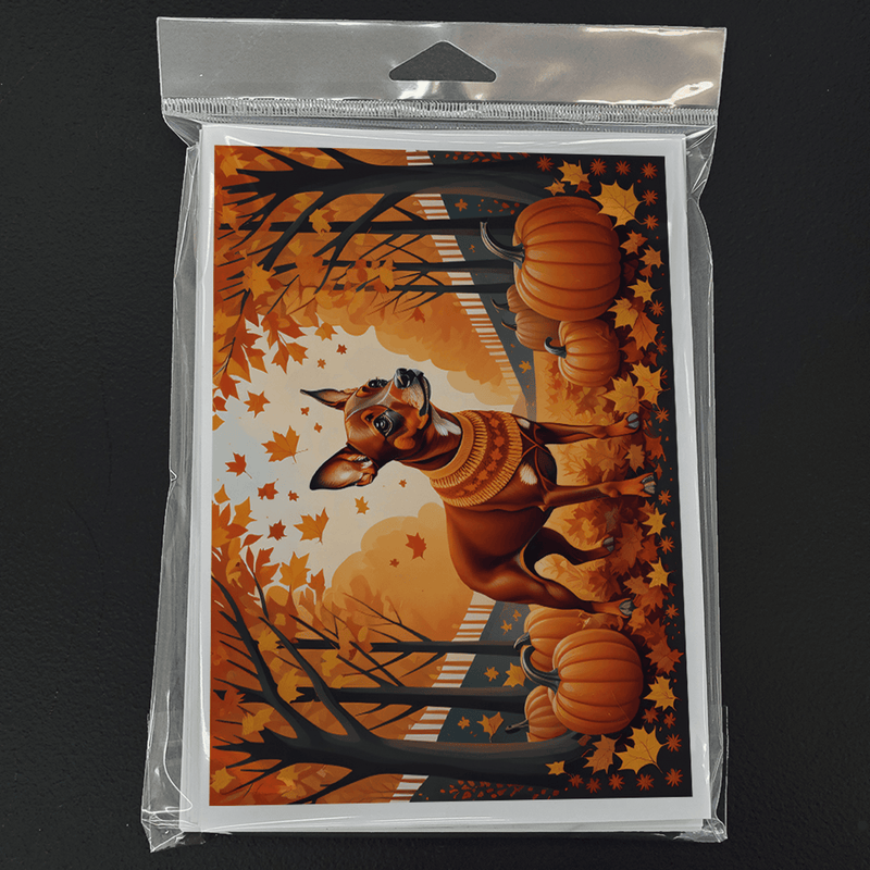 Packaged fall greeting card with miniature pinscher, pumpkins, and orange autumn trees