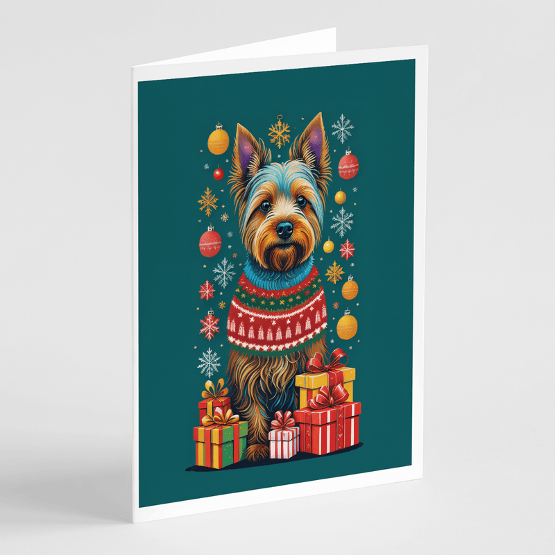 Holiday greeting card featuring an illustrated terrier with Christmas gifts and decorations
