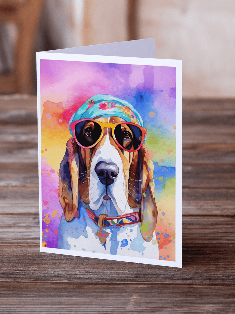 Greeting card of basset hound in colorful hat and sunglasses on wood table
