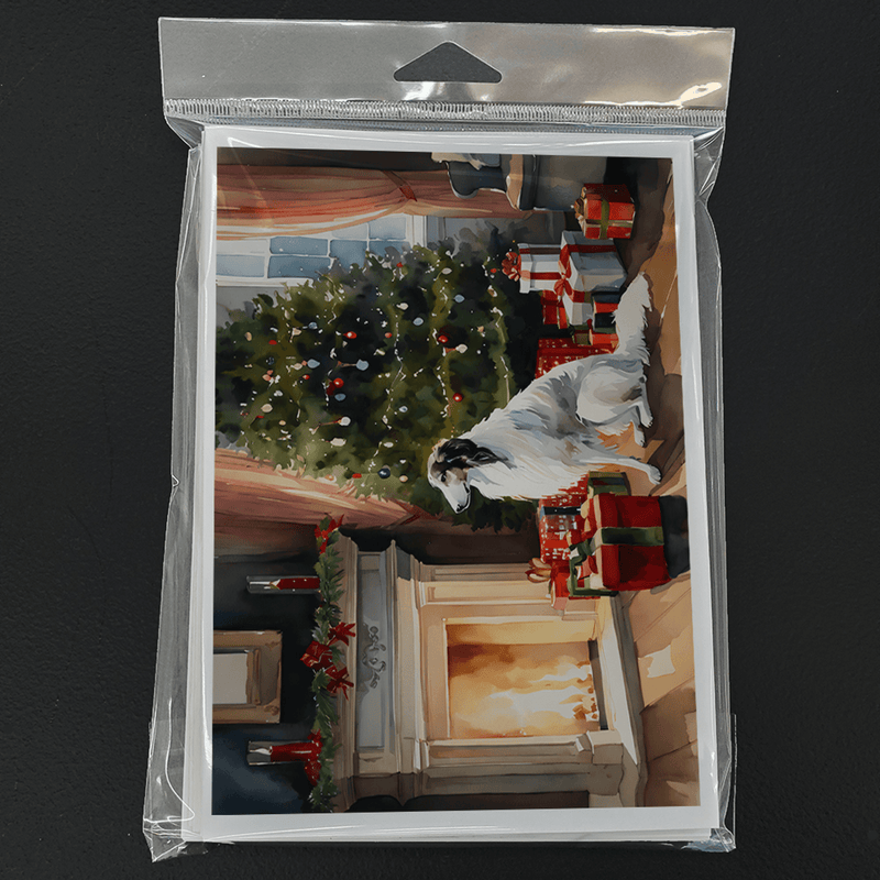 Packaged Christmas greeting cards with borzoi scene and tree, in clear plastic sleeve