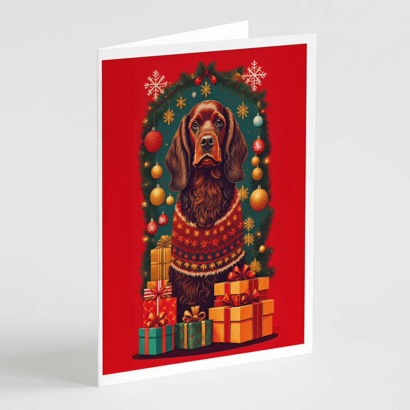 Greeting card with red background, spaniel portrait framed by wreath and wrapped presents