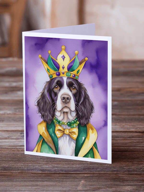 Greeting card showing Springer Spaniel king dog with jeweled crown, necklace, bow tie