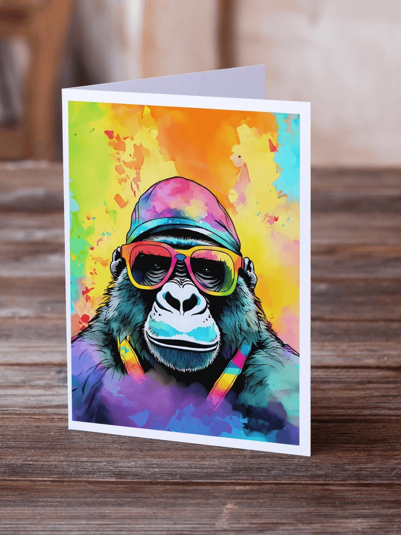 Gorilla greeting card on wooden table, neon rainbow cap and sunglasses illustrated