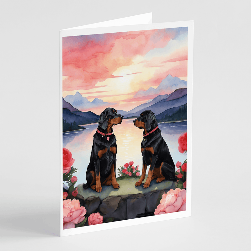 Greeting card showing two setter dogs facing, mountain lake sunset, pink floral accents