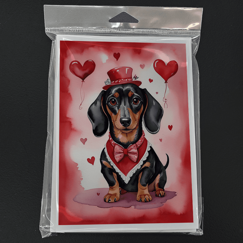 Valentine greeting card in clear plastic pack, dachshund with heart balloons