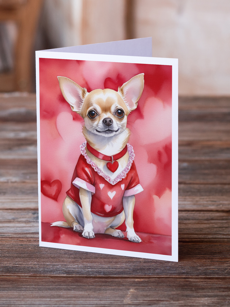 Valentine greeting card featuring a chihuahua in a red sweater and heart collar