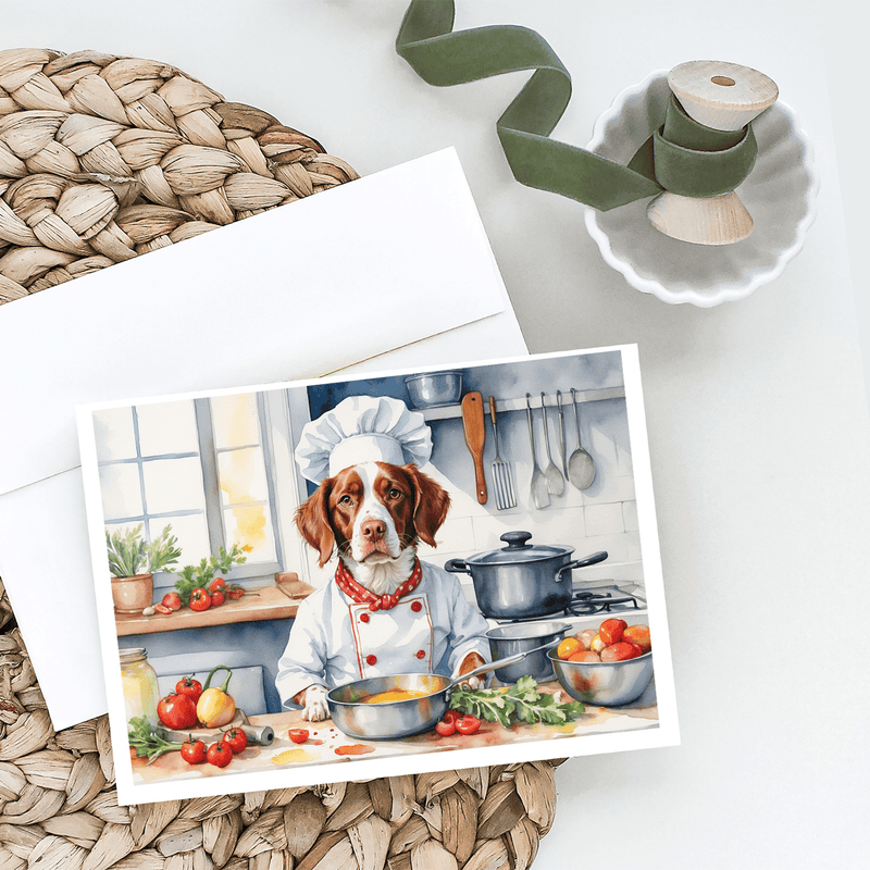 Greeting card pack with chef dog illustration, cards laid on woven placemat