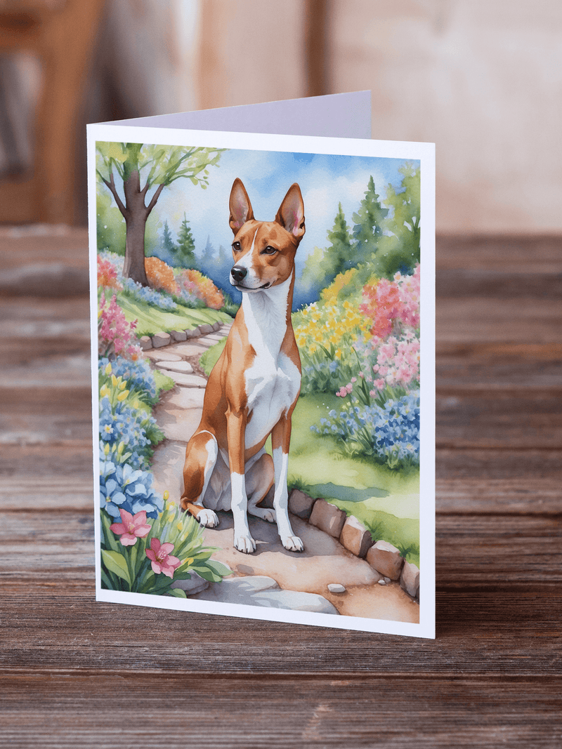Basenji spring garden greeting card on tabletop with basenji dog and flowers