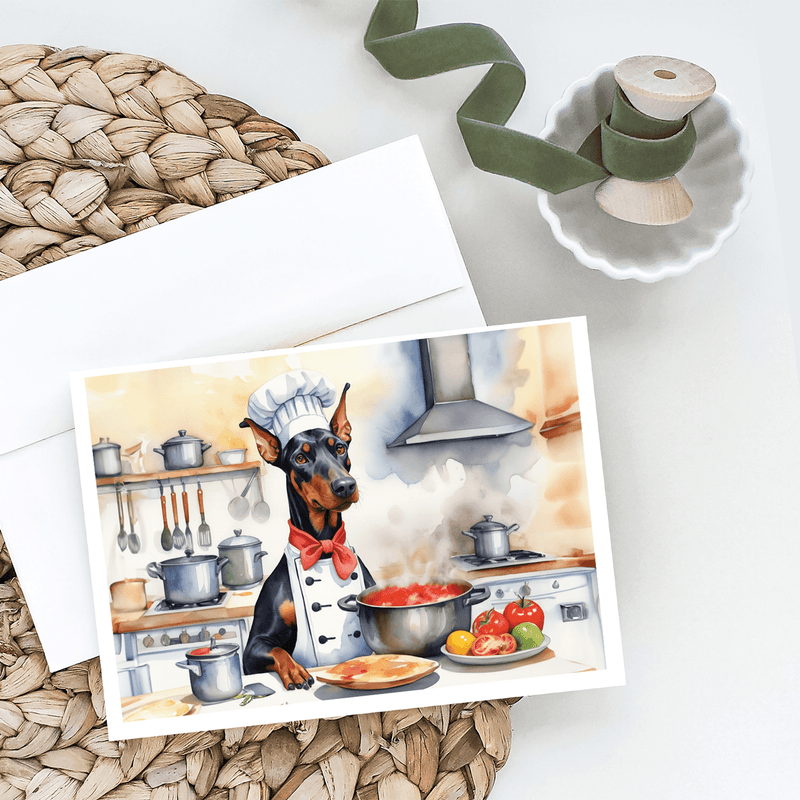 Set of greeting cards with a Doberman chef illustration, red bow tie and cookware