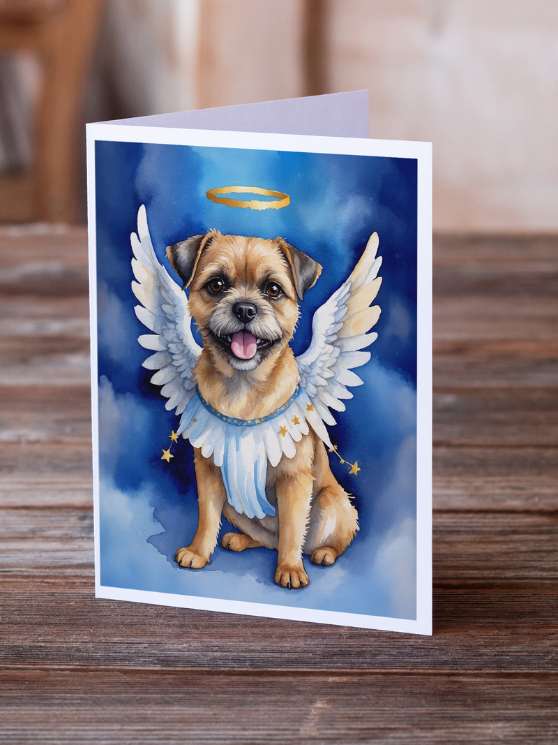 Border terrier angel greeting card standing on wood, white wings and blue watercolor backdrop