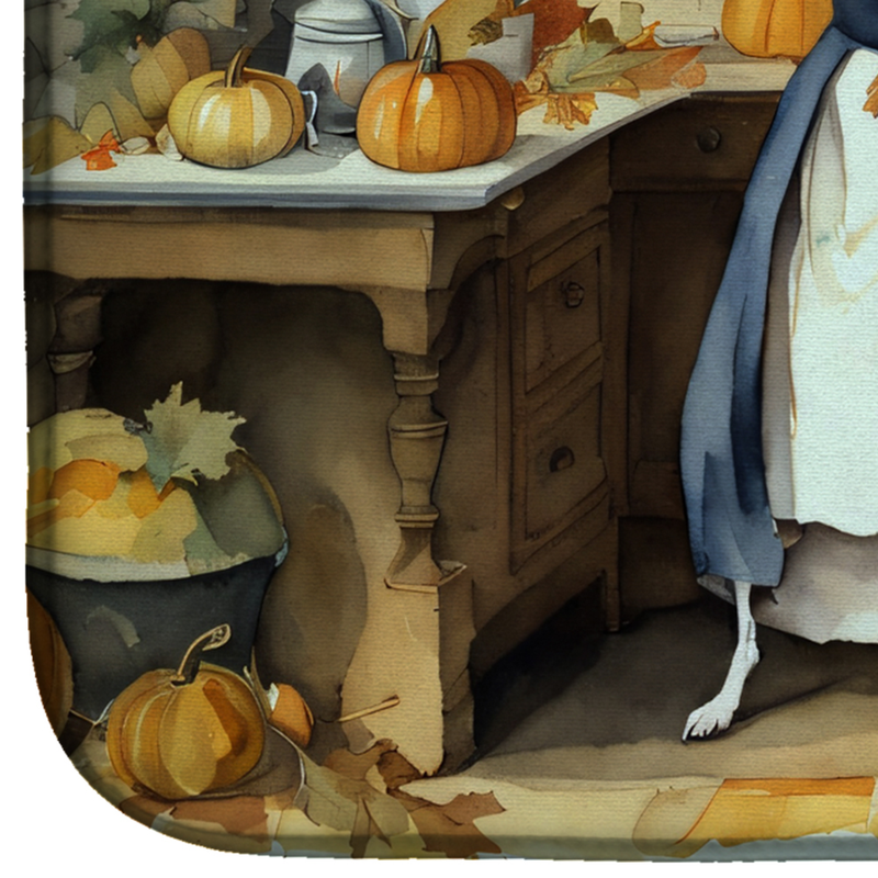 Close-up of fall pumpkin dish drying mat print with leaves and dog