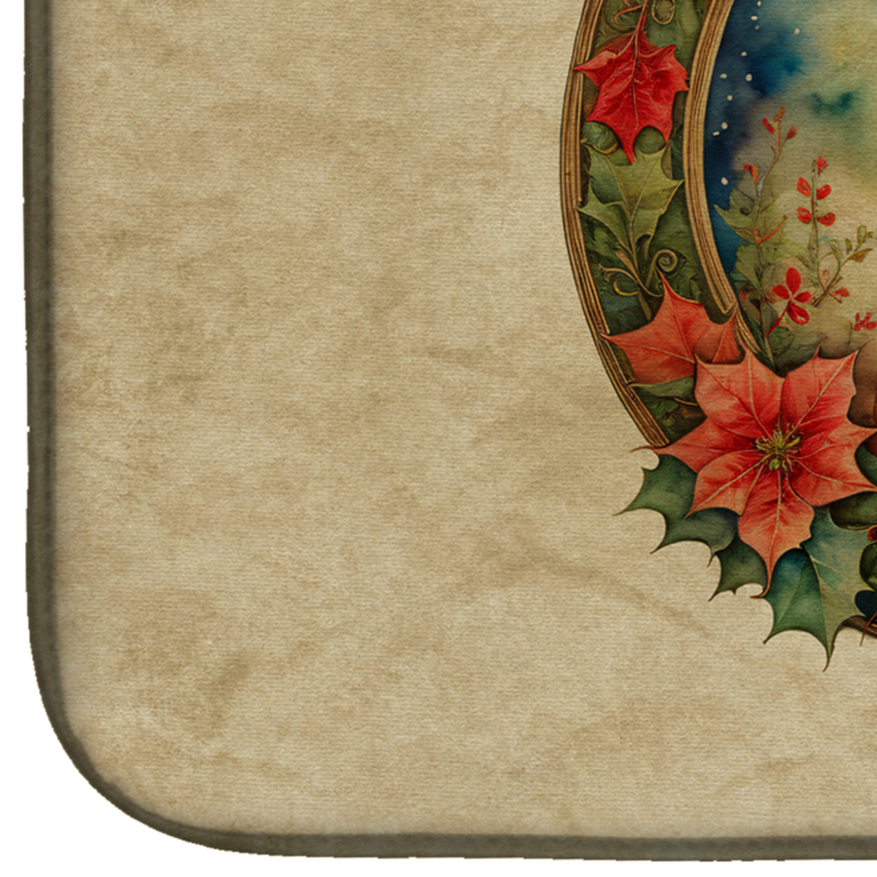 Dish drying mat corner close-up with poinsettia and holly leaf design