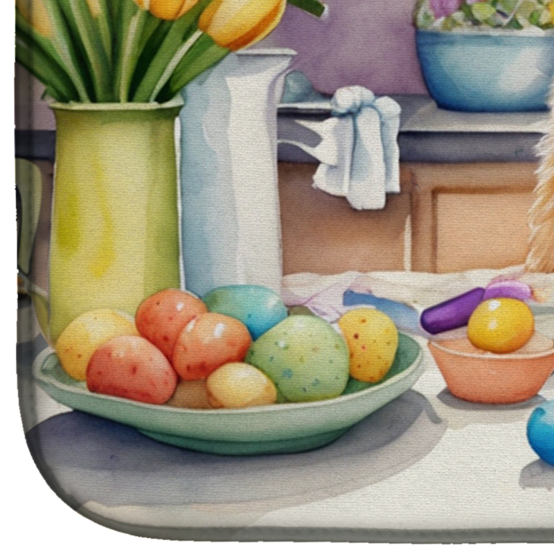 Dish drying mat corner showing a bowl of colorful Easter eggs