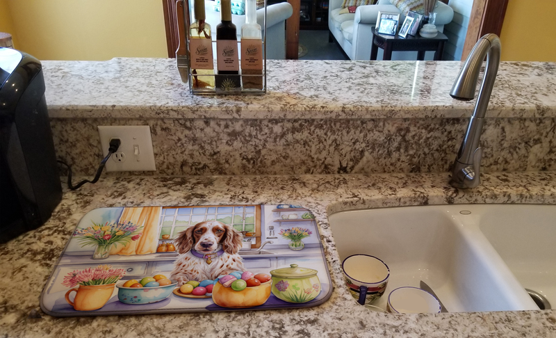 Dish drying mat on countertop with English setter and Easter eggs illustration