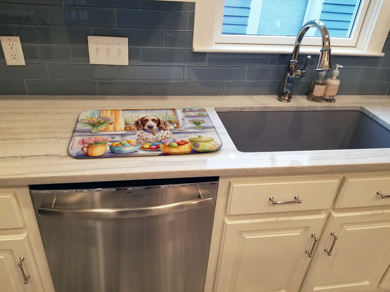 Dish drying mat featuring an English setter scene on a kitchen countertop