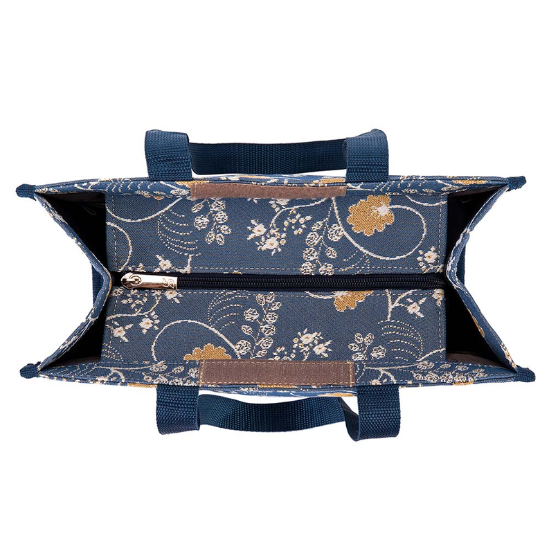 Blue floral shopper bag open at top with gold-toned zipper and front interior panel.