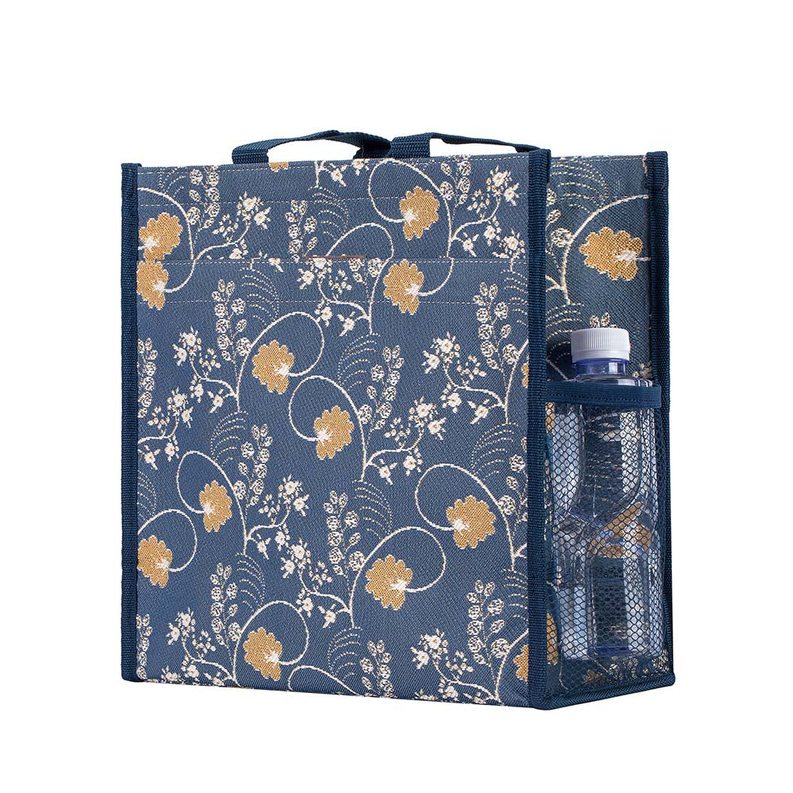 Blue floral shopper bag with side mesh pocket holding a small bottle or container.