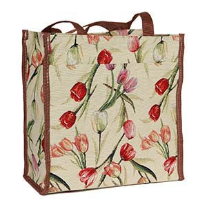 White floral shopper bag with brown handles and open top.