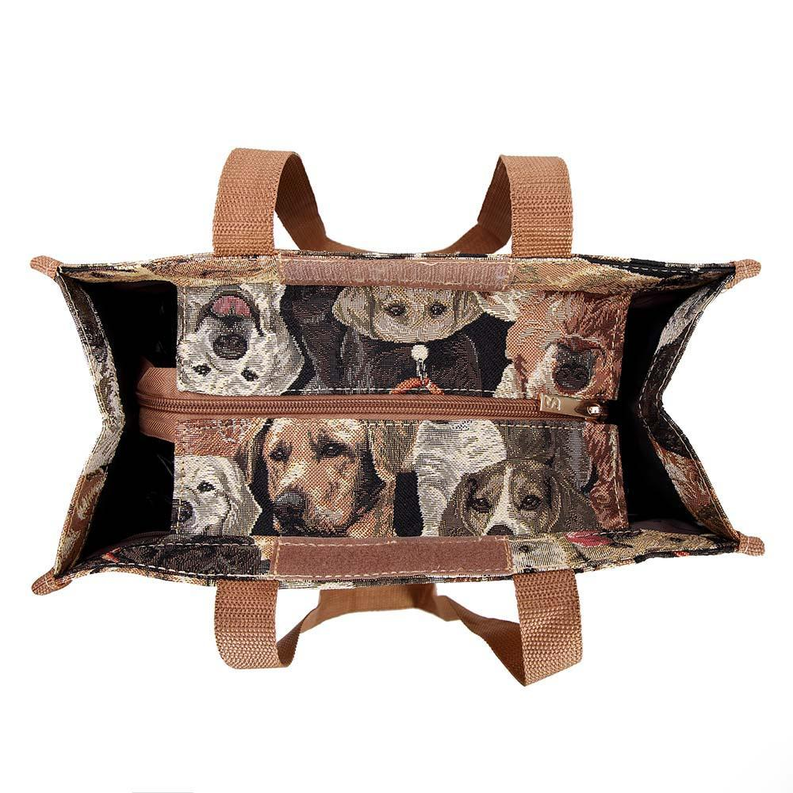 Dog-themed tote bag shown open with long web handles and zippered top opening.