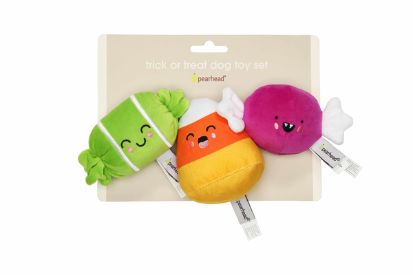 Plush trick-or-treat dog toy set with caterpillar, pumpkin, purple ghost, and bone