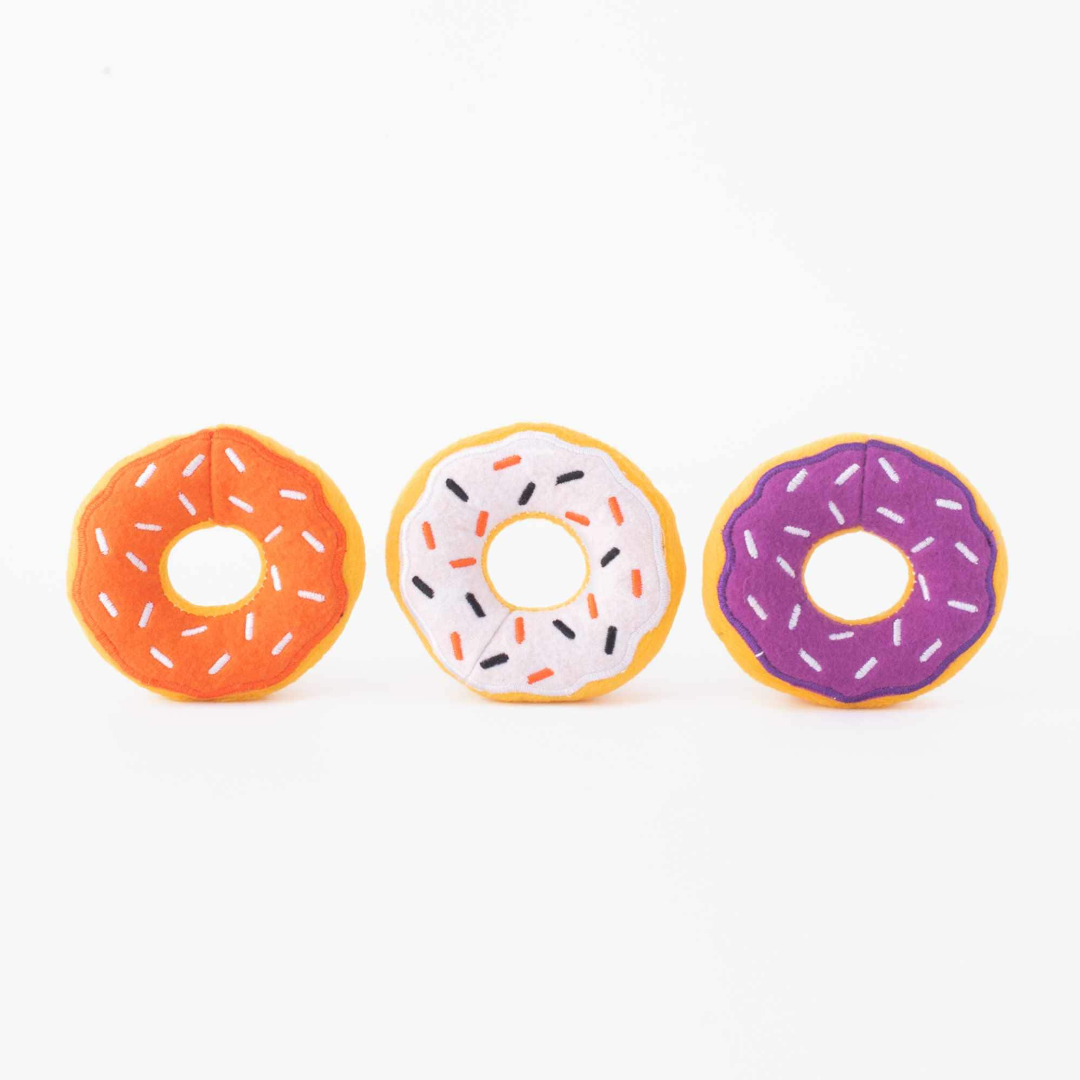 ZippyPaws Miniz Halloween Donutz 3-pack plush donuts in orange, white, and purple
