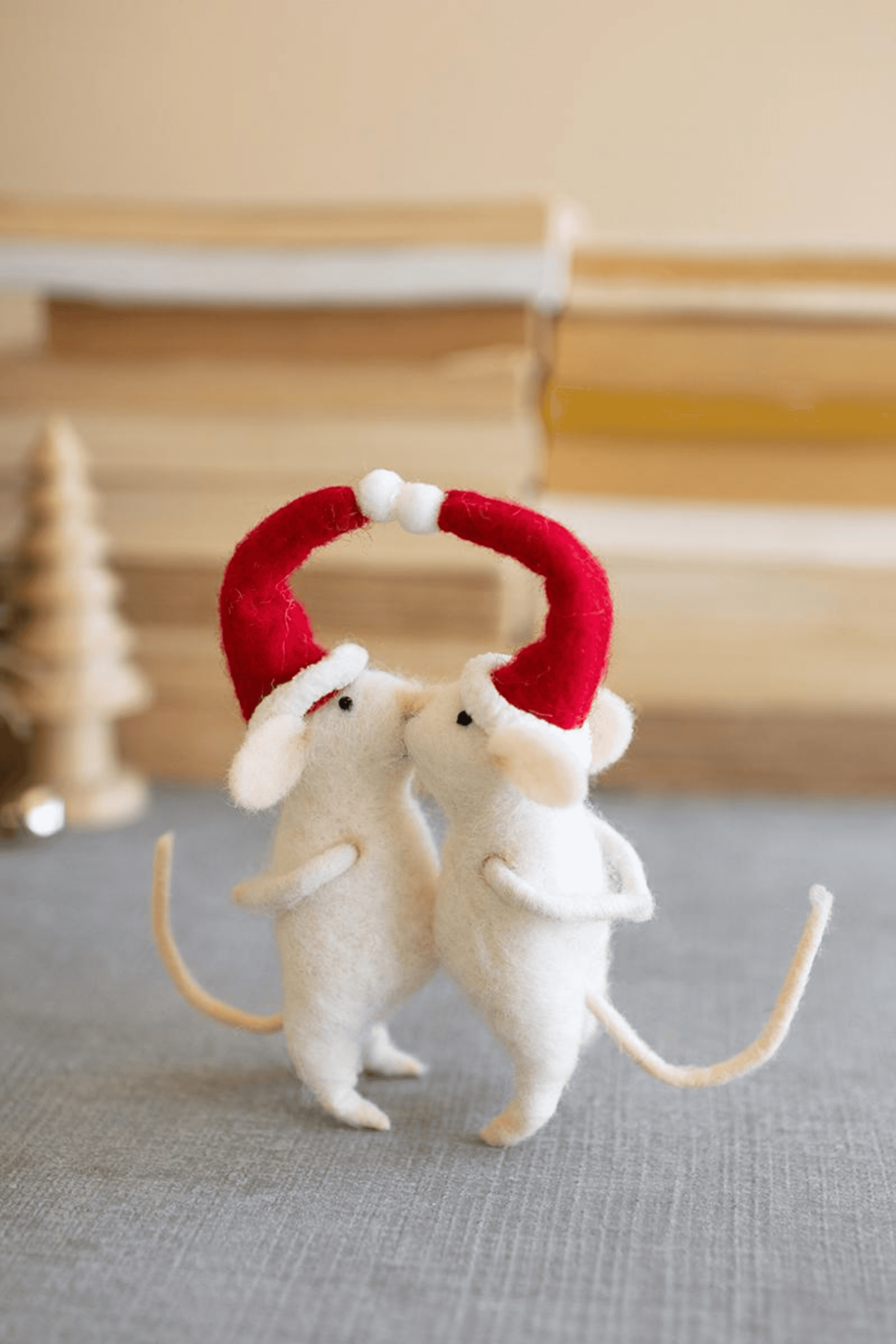 Kissing felt Christmas mice, side view, red wreath arms and white bead detail