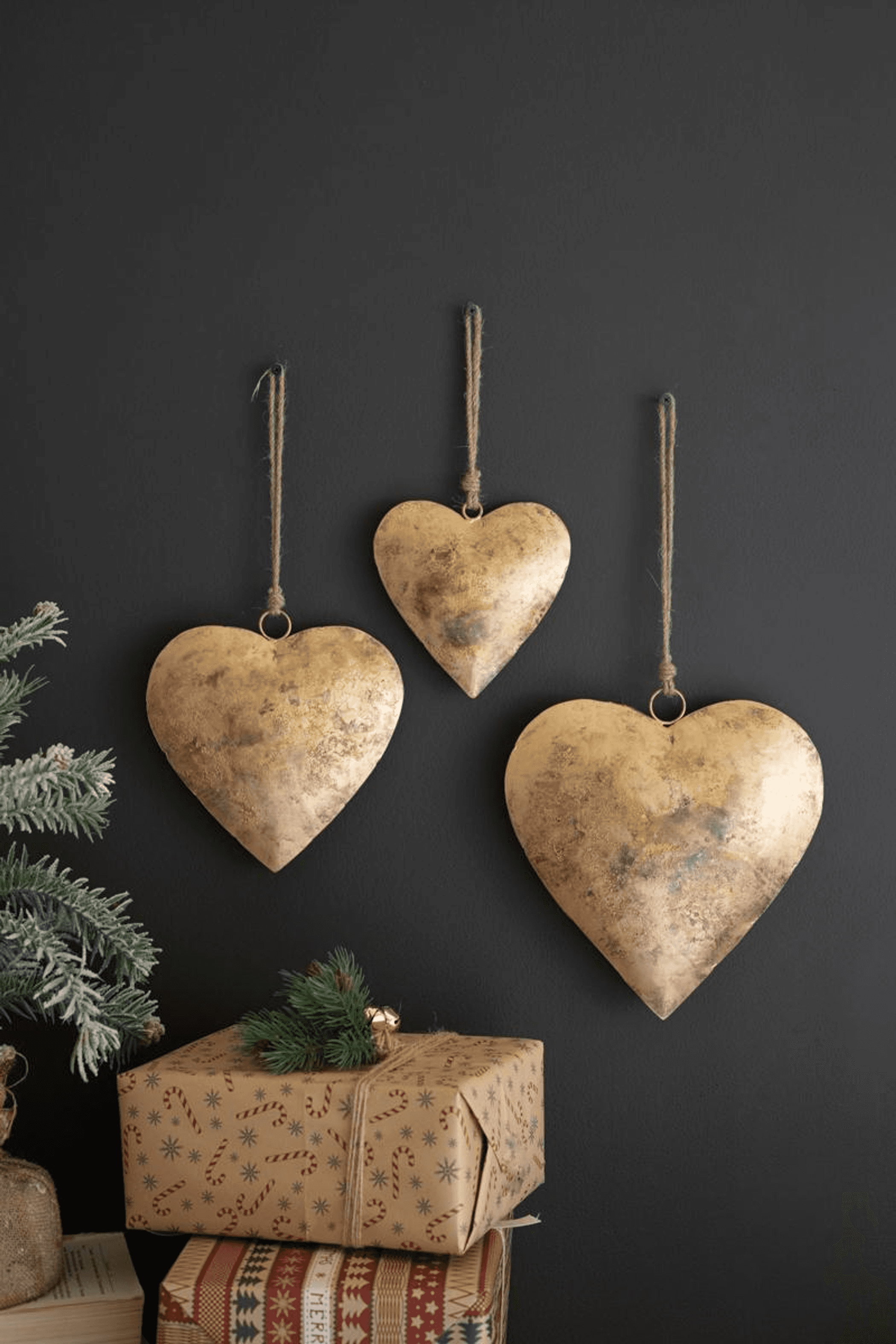 Set of three antique gold heart door hangers with hanging twine loops