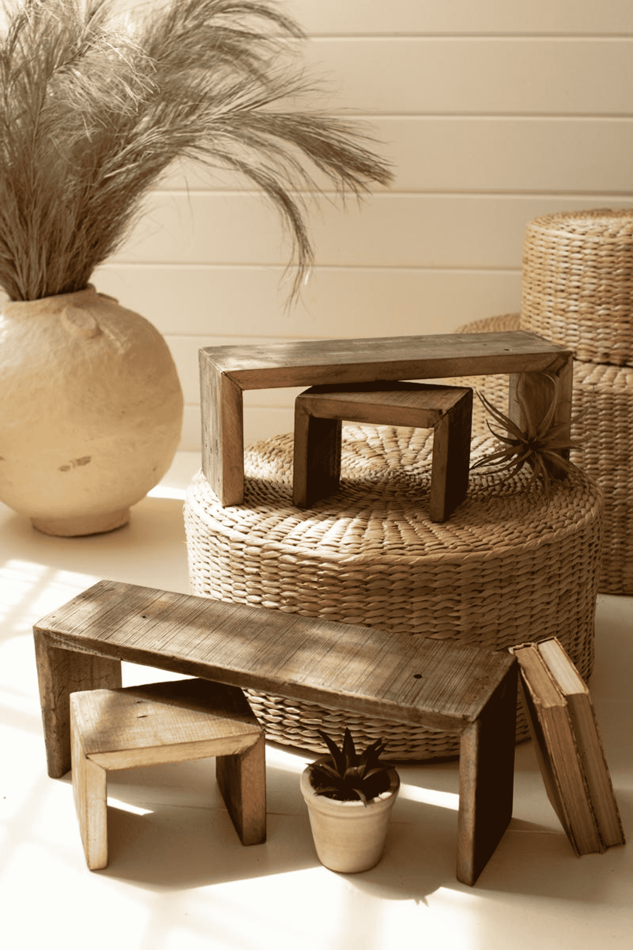 Set of four recycled wood nesting rectangle risers in brown, assorted sizes