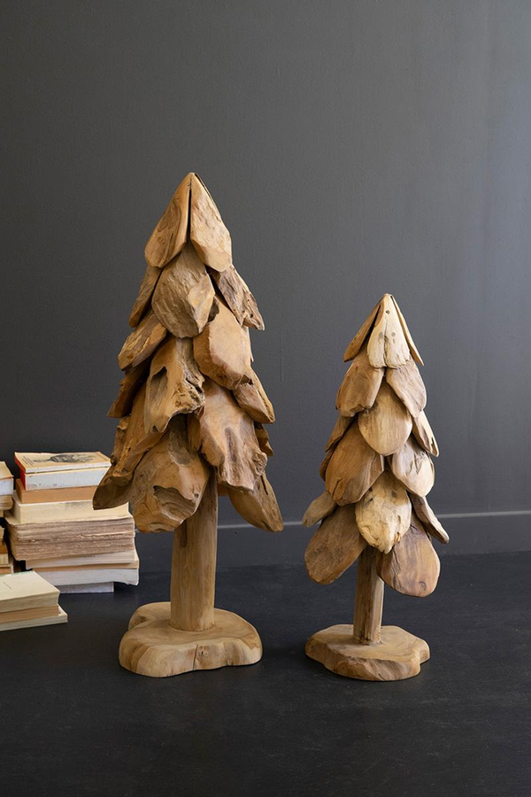 Large rustic wooden Christmas tree decor with stacked carved layers on pedestal base