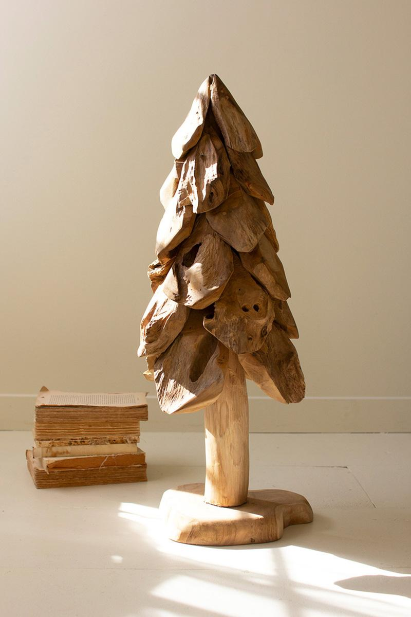 Large rustic wooden Christmas tree decor with layered carved wood on round pedestal base