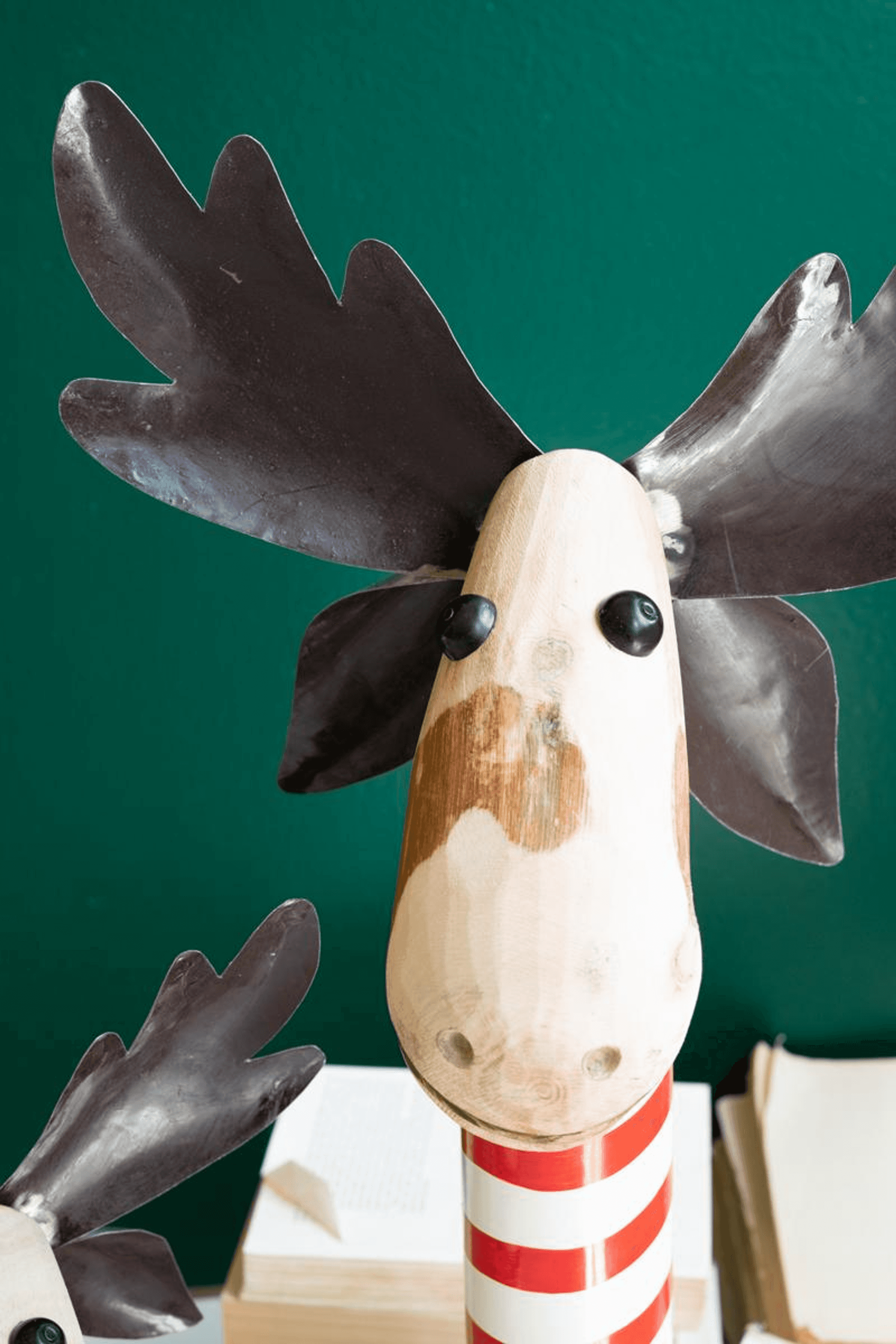 Set of 2 moose figures with recycled iron body and red-and-white striped wood base