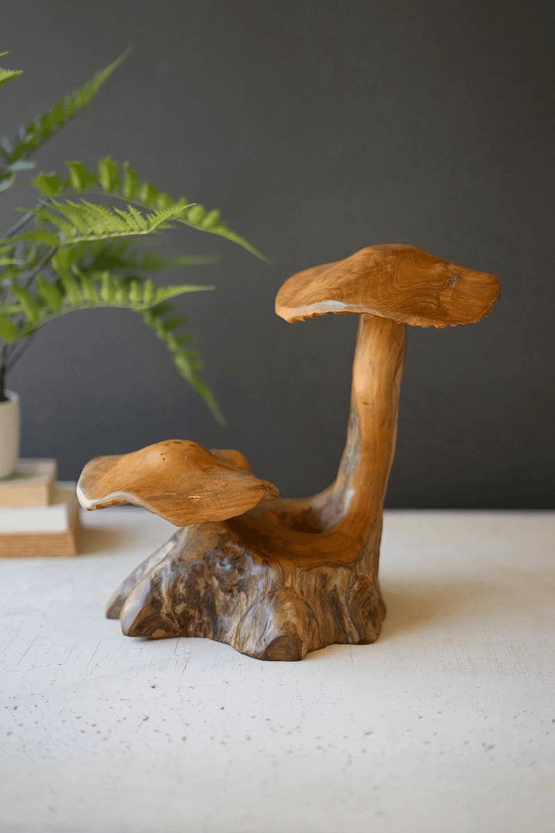 Double teak mushroom sculpture with two mushroom caps on slender stems