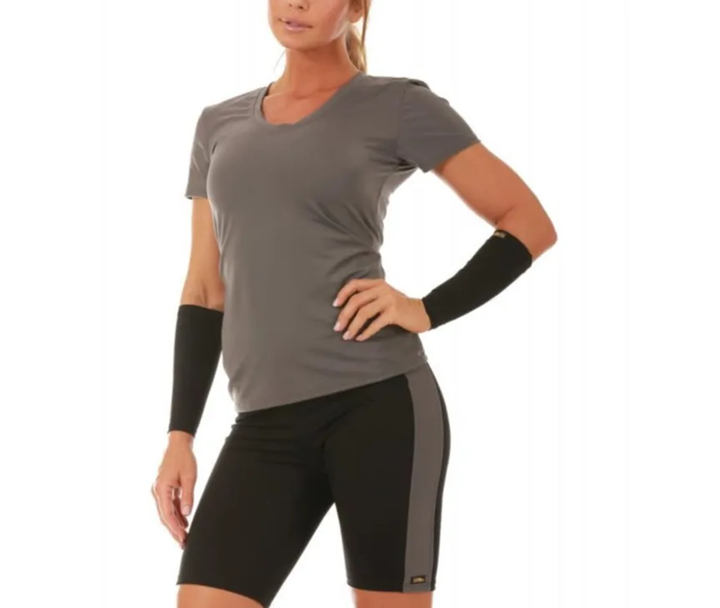 Black compression shorts with white side stripe, mid-thigh length
