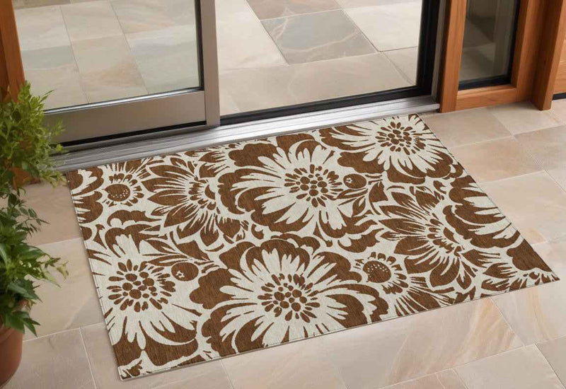 2' X 3' Brown and Ivory Floral Washable Non Skid Indoor Outdoor Area Rug