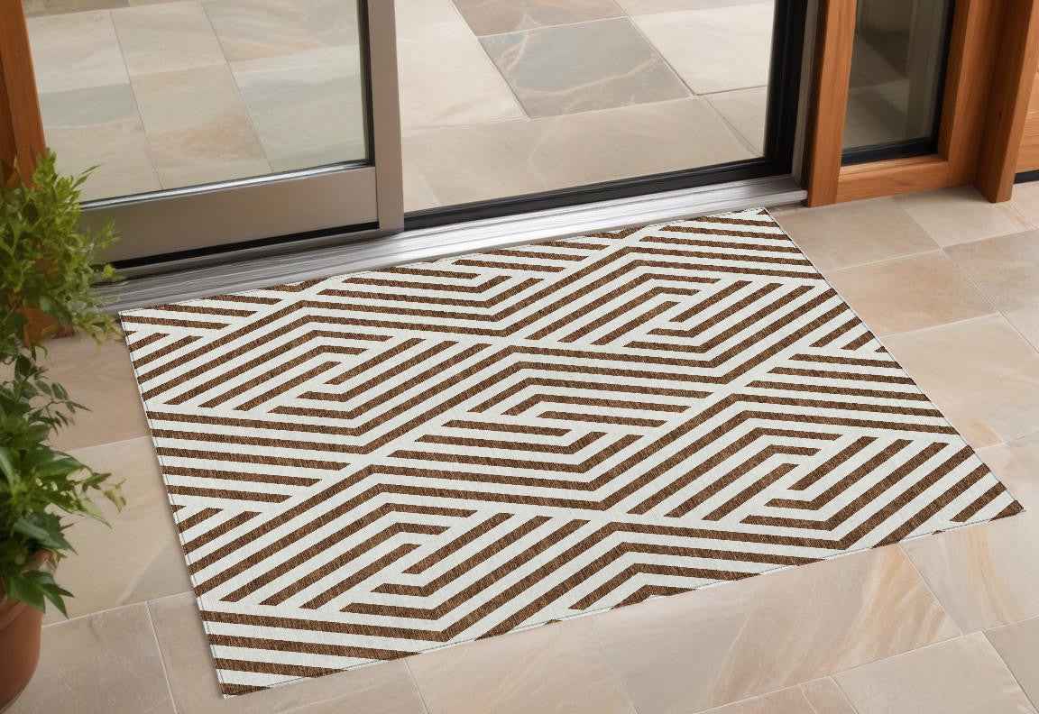 2' X 3' Brown and White Geometric Washable Non Skid Indoor Outdoor Area Rug