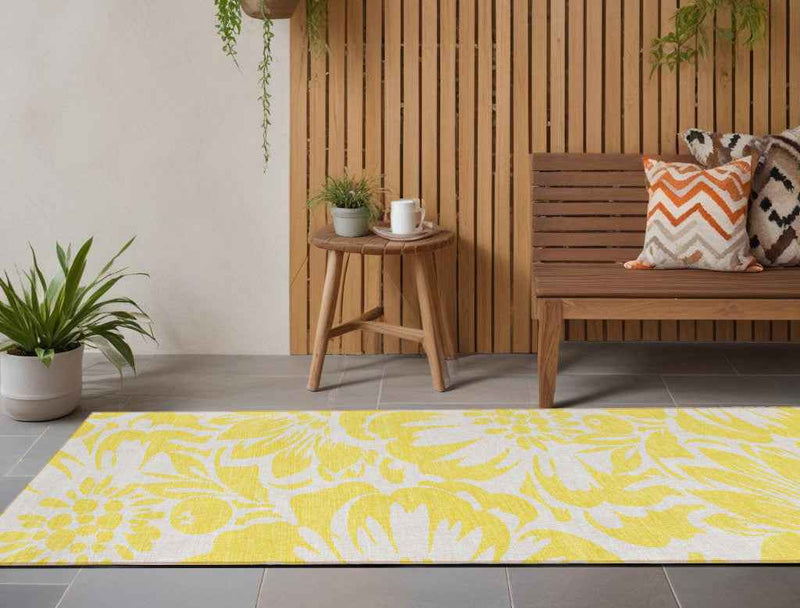 2' X 8' Yellow and Ivory Floral Washable Non Skid Indoor Outdoor Runner Rug