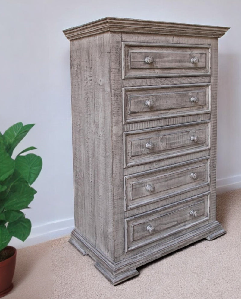 Gray distressed solid wood five-drawer chest with decorative trim and round knobs
