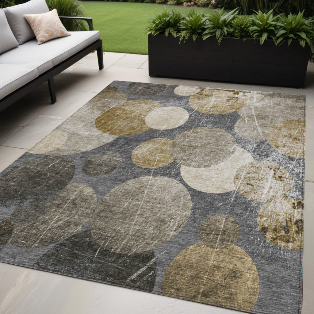 5' X 8' Brown Beige and Ivory Abstract Washable Non Skid Indoor Outdoor Area Rug