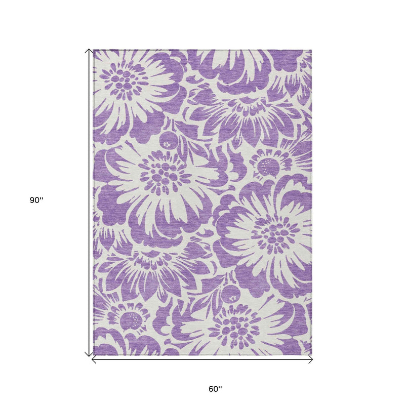 5' X 8' Purple and Ivory Floral Washable Non Skid Indoor Outdoor Area Rug