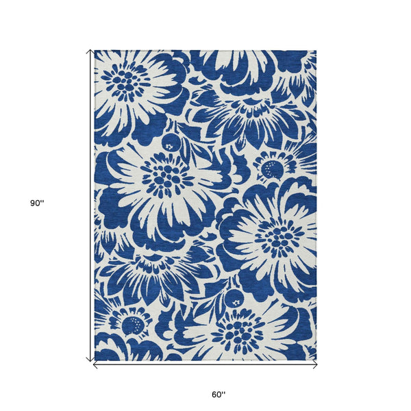 5' X 8' Navy and Ivory Floral Washable Non Skid Indoor Outdoor Area Rug