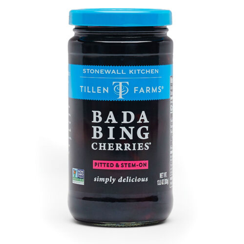 Jar of Bada Bing cherries with blue lid, Stonewall Kitchen label, pitted & stem-on