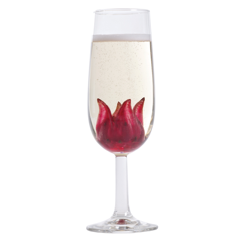 Champagne flute with hibiscus syrup and red hibiscus flowers