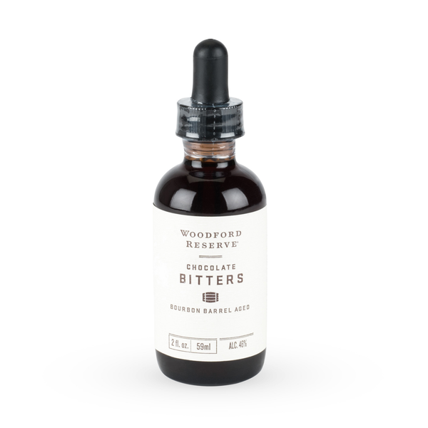 Woodford Reserve Chocolate Bitters bottle with black dropper, bourbon barrel aged