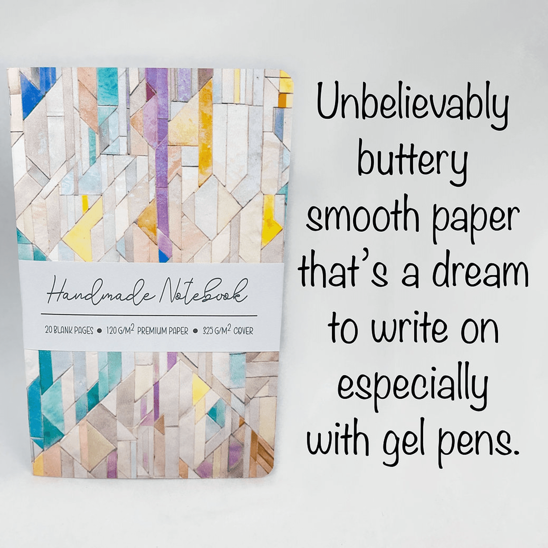 Handmade notebook front cover with geometric tile pattern and white label strip.