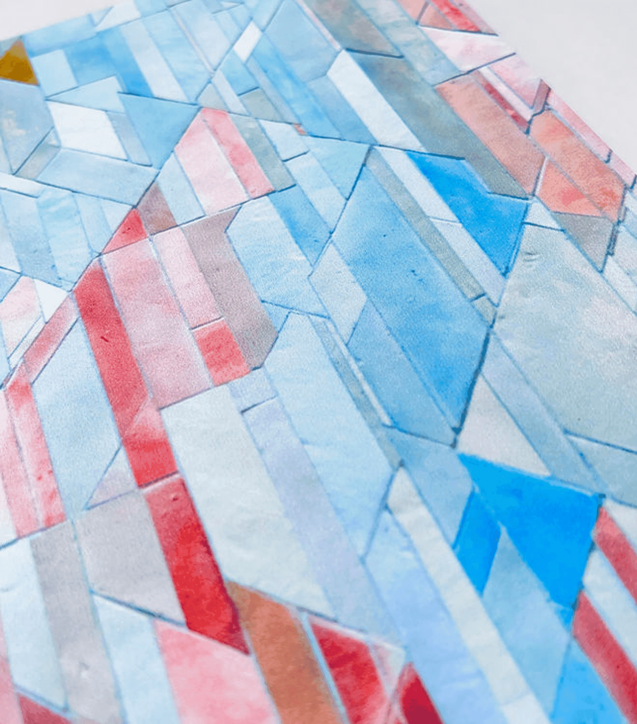 Close-up of geometric tiles notebook cover pattern in light blue and red