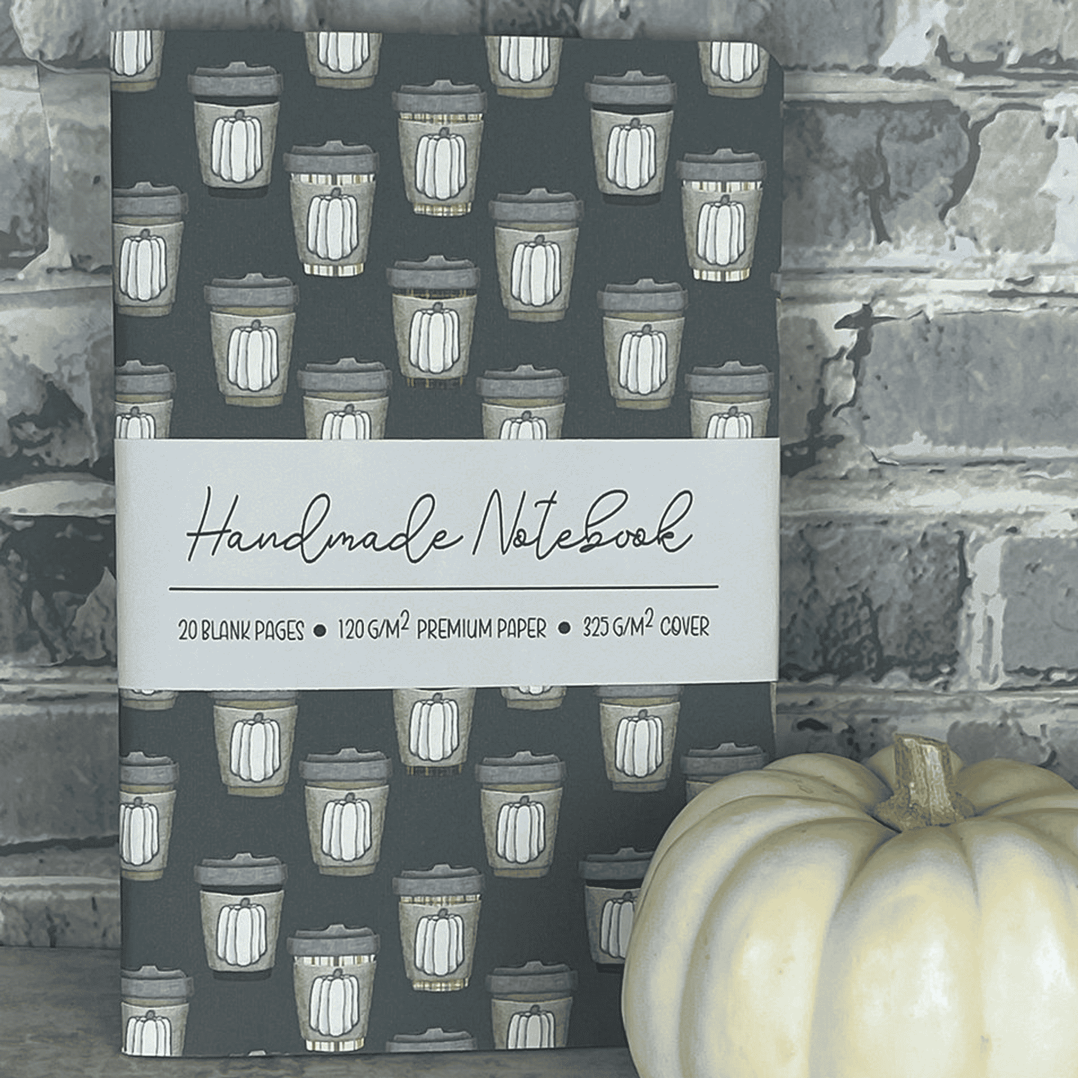 Handmade notebook with dark blue-green pumpkin spice jar pattern cover and title strip