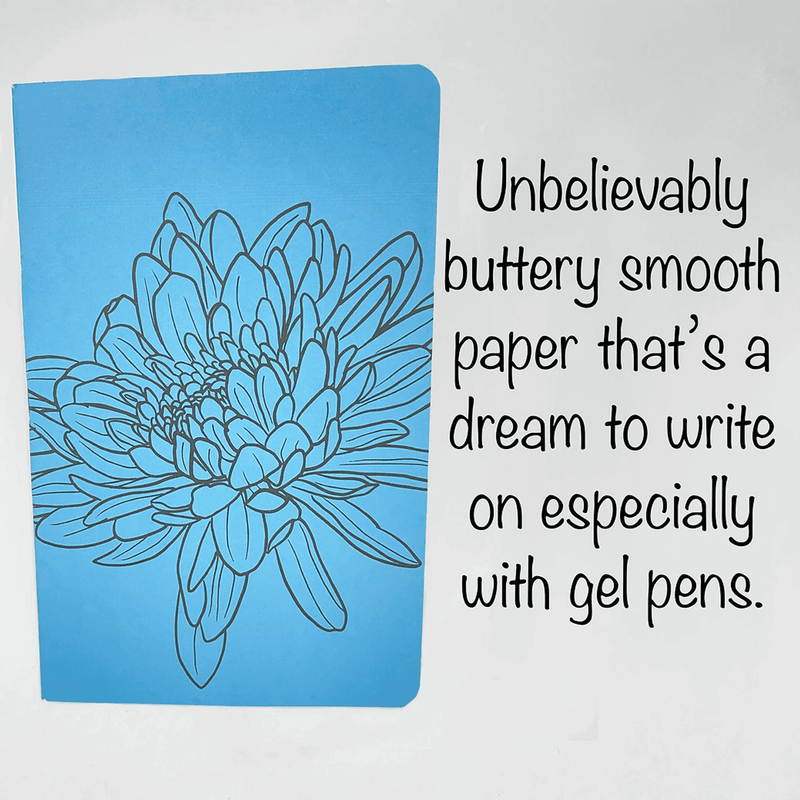 Blue notebook with hand-drawn teal flower line art on the front