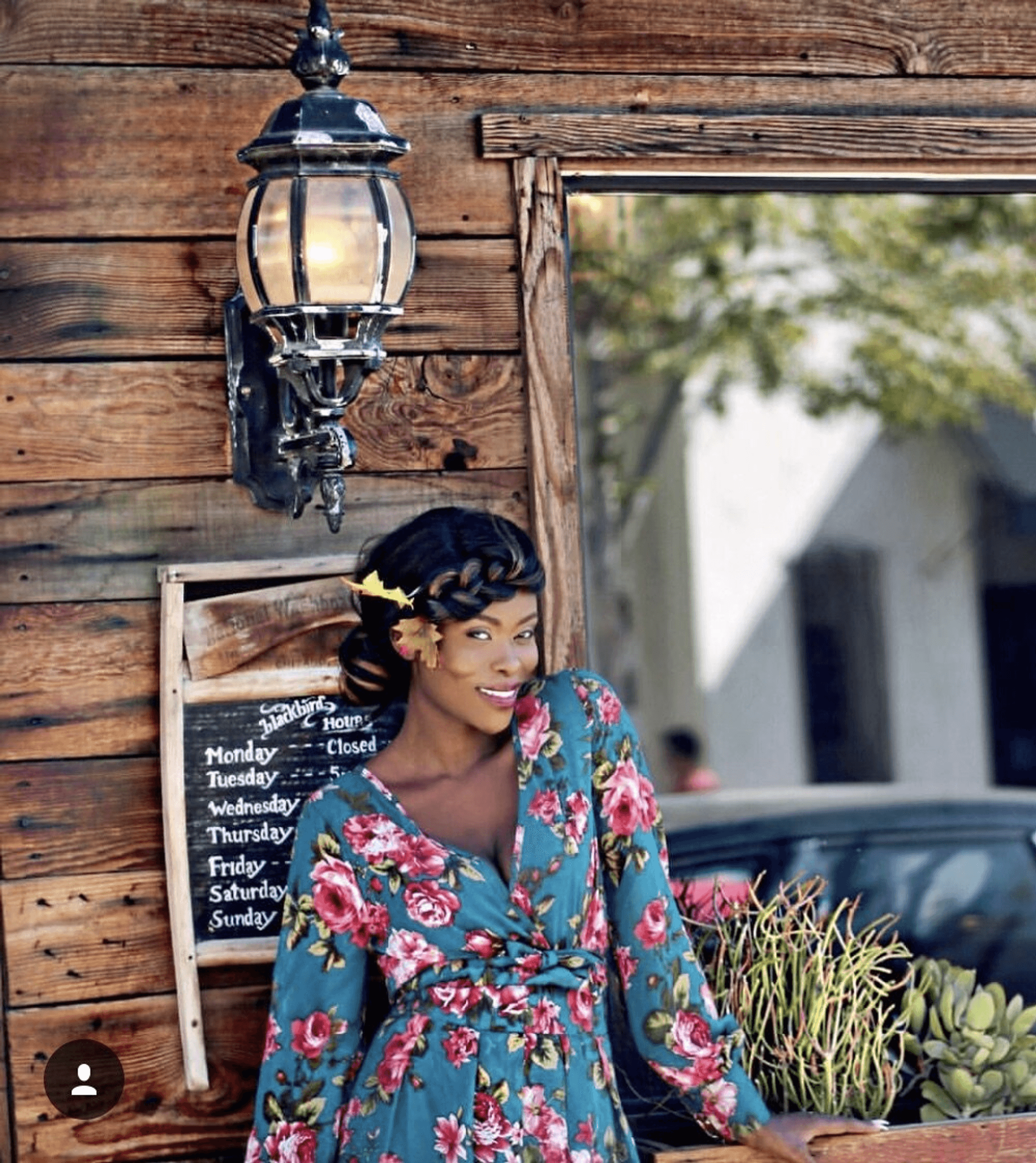 Two-piece floral maxi set with long sleeves, V-neck wrap bodice, and side slit skirt