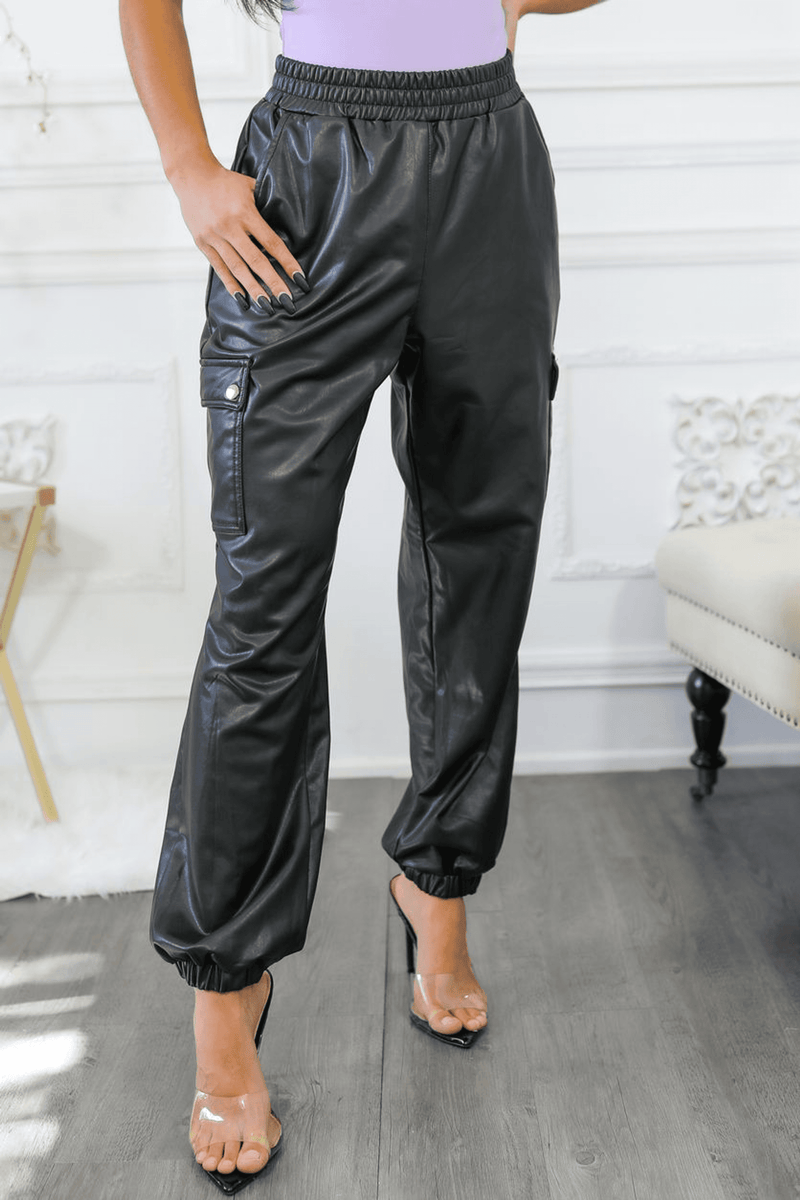 Dark faux leather cargo jogger pants with adjustable cuffed hem and side pocket